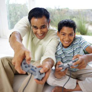 Father and Son Playing Video Games