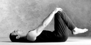 Picture of rolling knees out to stretch your lower back